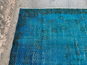 Faded blue rug, 7x10.9 ft, B722