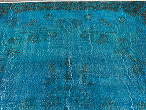 Faded blue rug, 7x10.9 ft, B722
